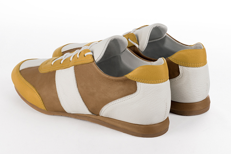 Mustard yellow, camel beige and off white three-tone dress sneakers for men. Round toe. Flat wedge soles. Rear view - Florence KOOIJMAN